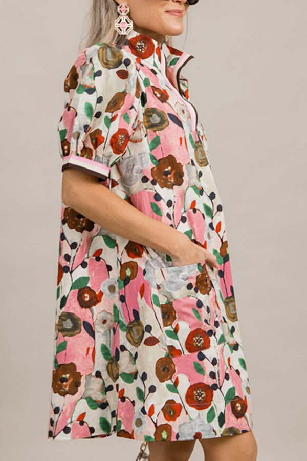 Jenny | Jurk met bloemenprint, pofmouwen en zakken