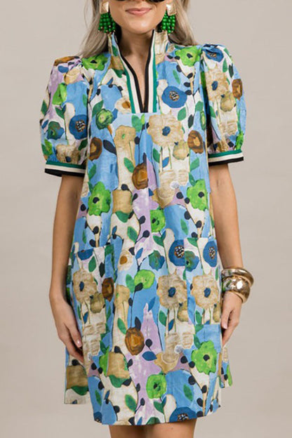 Jenny | Jurk met bloemenprint, pofmouwen en zakken