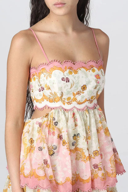 Strapless jurk met geborduurde bretels