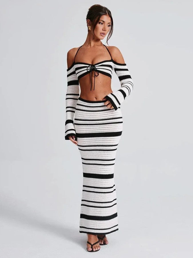 Dunne gebreide crop tops en lange rokken