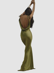 Elegante groene maxi-jurk met spaghettibandjes tot op de vloer