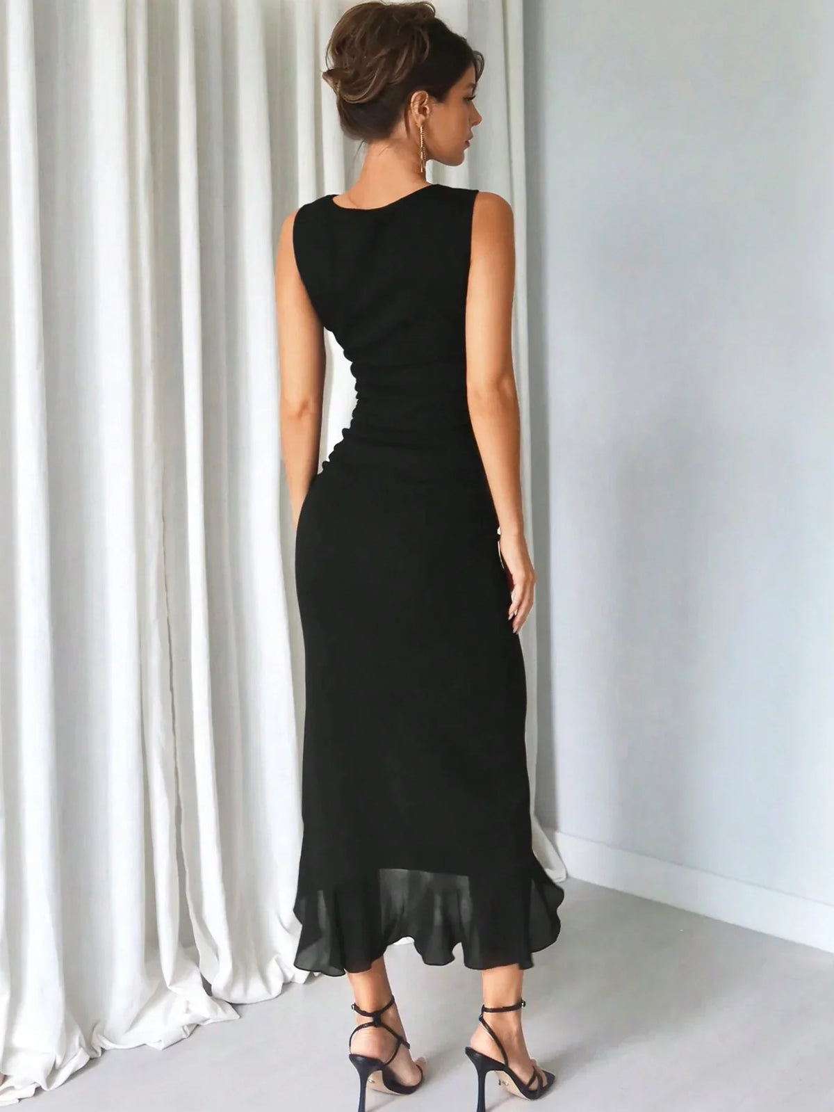 Rugloze jurk met gestileerde taille
