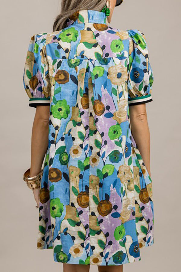 Jenny | Jurk met bloemenprint, pofmouwen en zakken