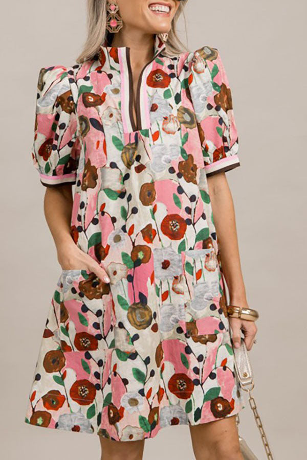 Jenny | Jurk met bloemenprint, pofmouwen en zakken