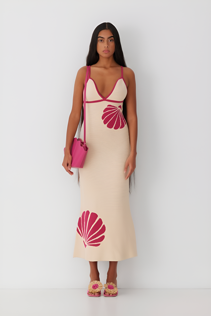 Elegante maxijurk met schelpendetail