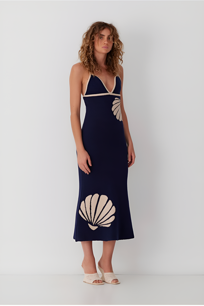 Elegante maxijurk met schelpendetail