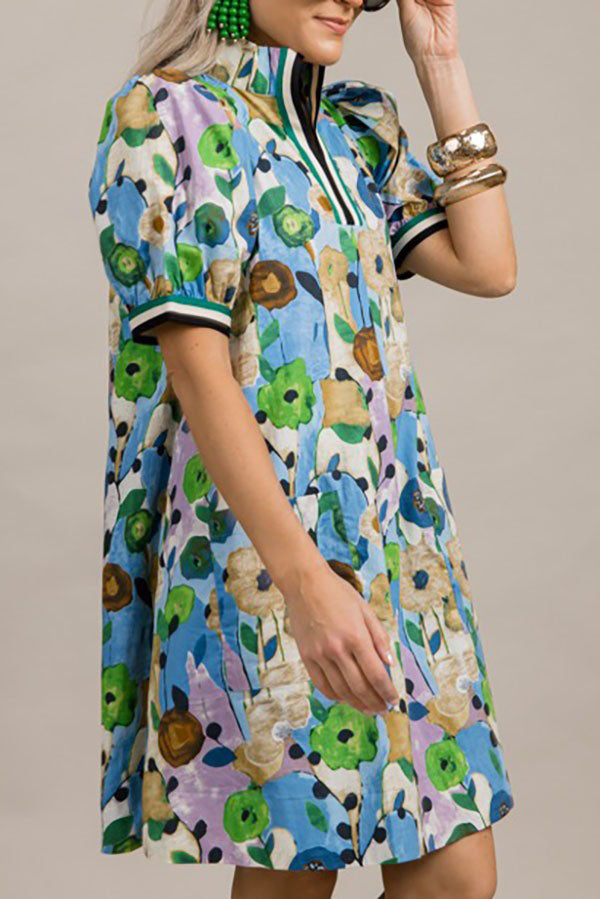 Jenny | Jurk met bloemenprint, pofmouwen en zakken