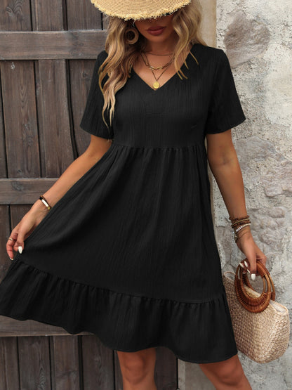 Elegante zomermini-jurk met V-hals